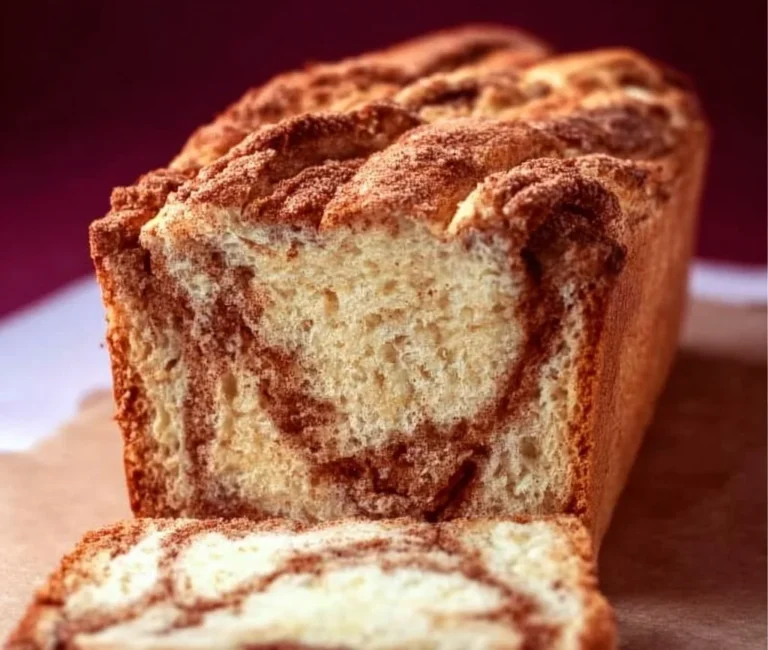 Freshly baked gluten-free cinnamon swirl bread with a delicious swirl