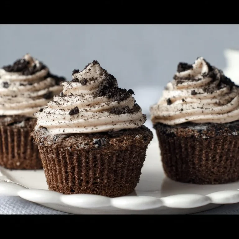 Delicious gluten-free cookies and cream cupcakes topped with creamy frosting.