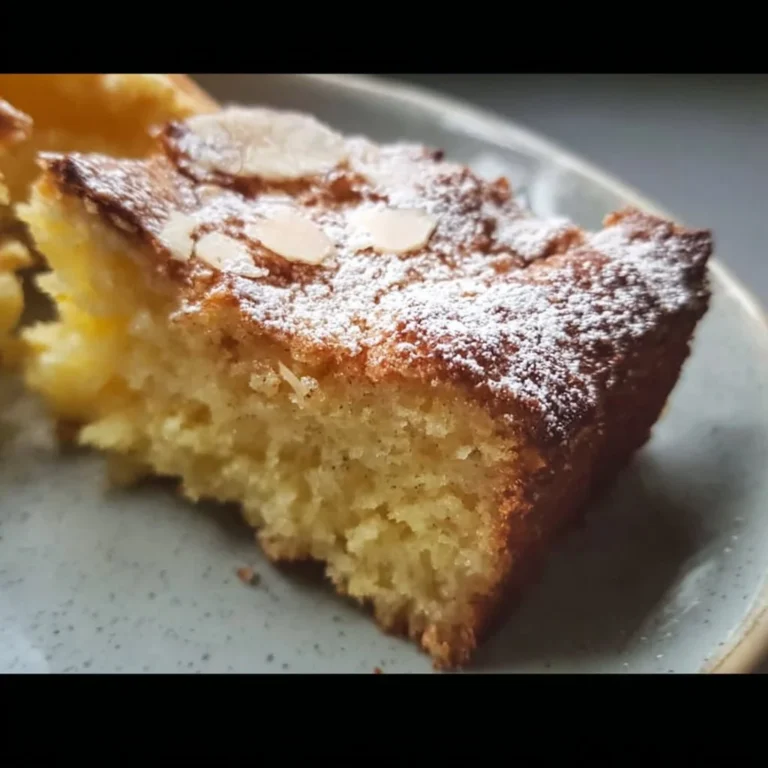 Delicious soft and moist gluten-free cake served on a plate.